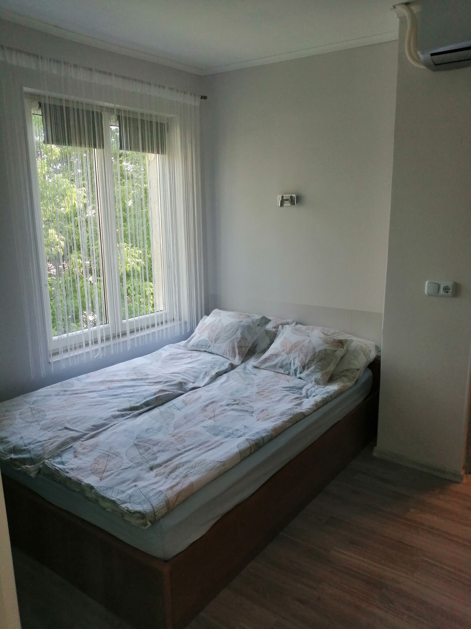Világos hálószoba a felső apartmanban